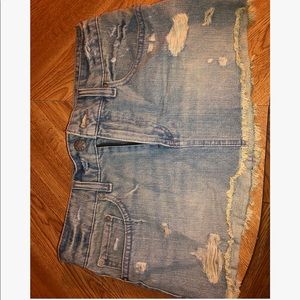 Ripped denim mini skirt